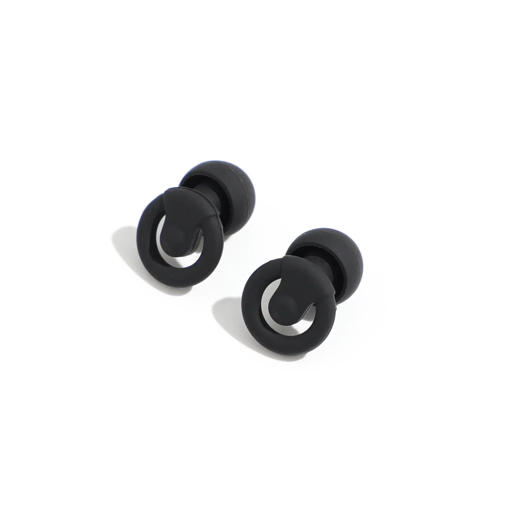 Pair of black earrings on a white background