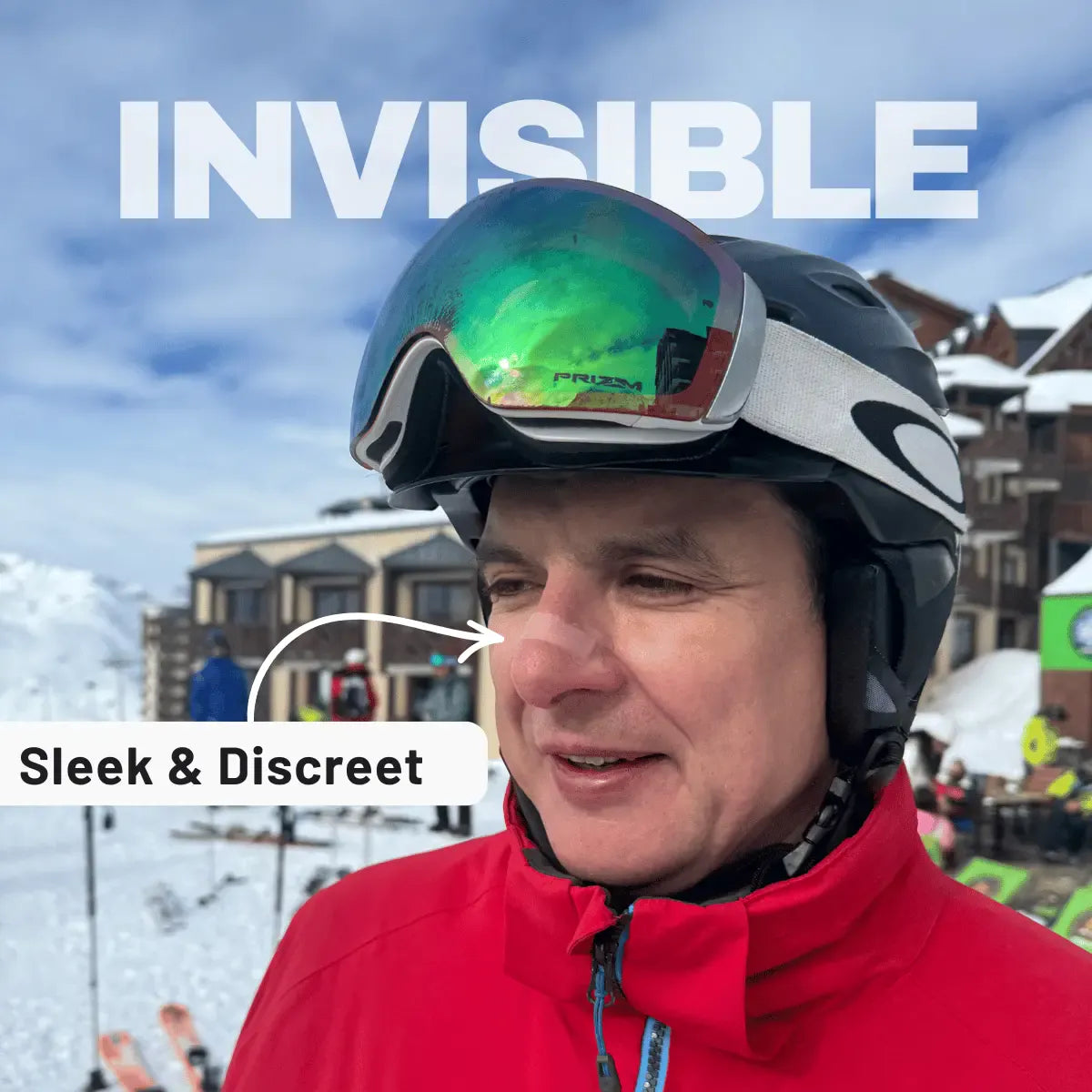 Person wearing a helmet with goggles on a snowy background, with text 'INVISIBLE' and 'Sleek & Discreet'.